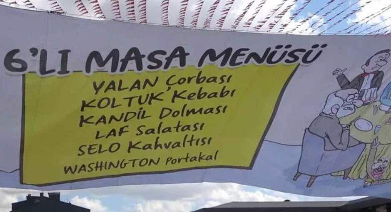 Cumhurbaşkanı Erdoğan konuşma yaparken 6’lı masayla ilgili pankarta dikkat çekti: Ne var bu menüde?